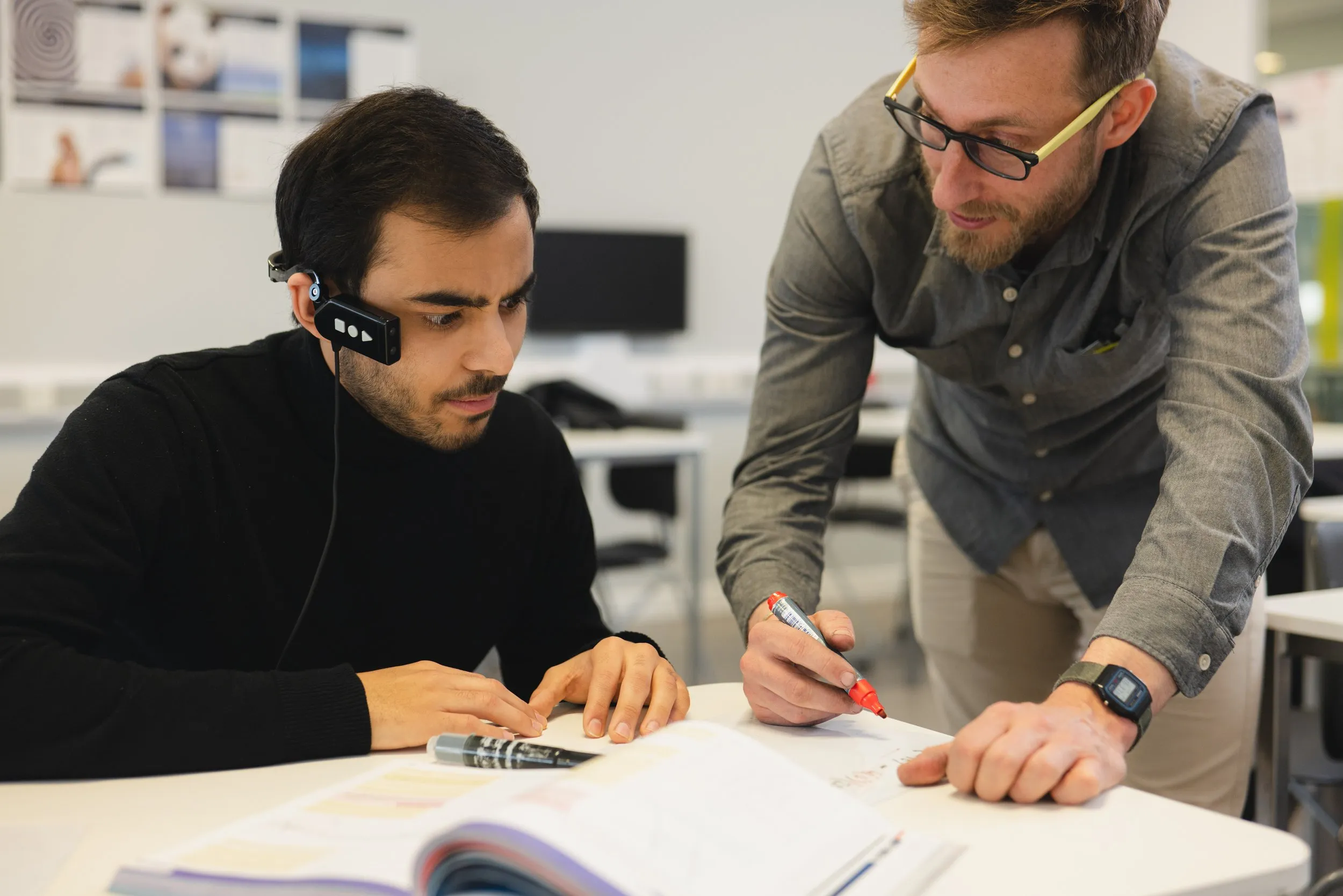 Two colleagues collaborating with AR wearable tech, technology branding photography, London